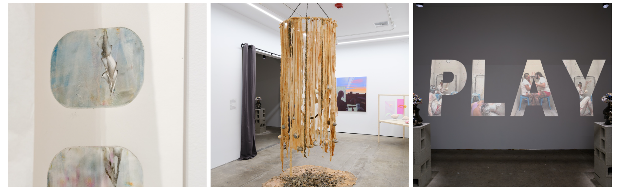 Triptych of art made by SJSU MFAs: Left, two abstract paintings with muted colors and organic shapes. Center, a hanging sculpture with strips and debris below. Right, large "PLAY" text on a gray wall with images inside the letters.