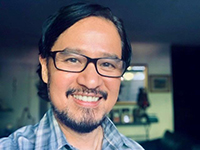 headshot photo of Luis Arabit